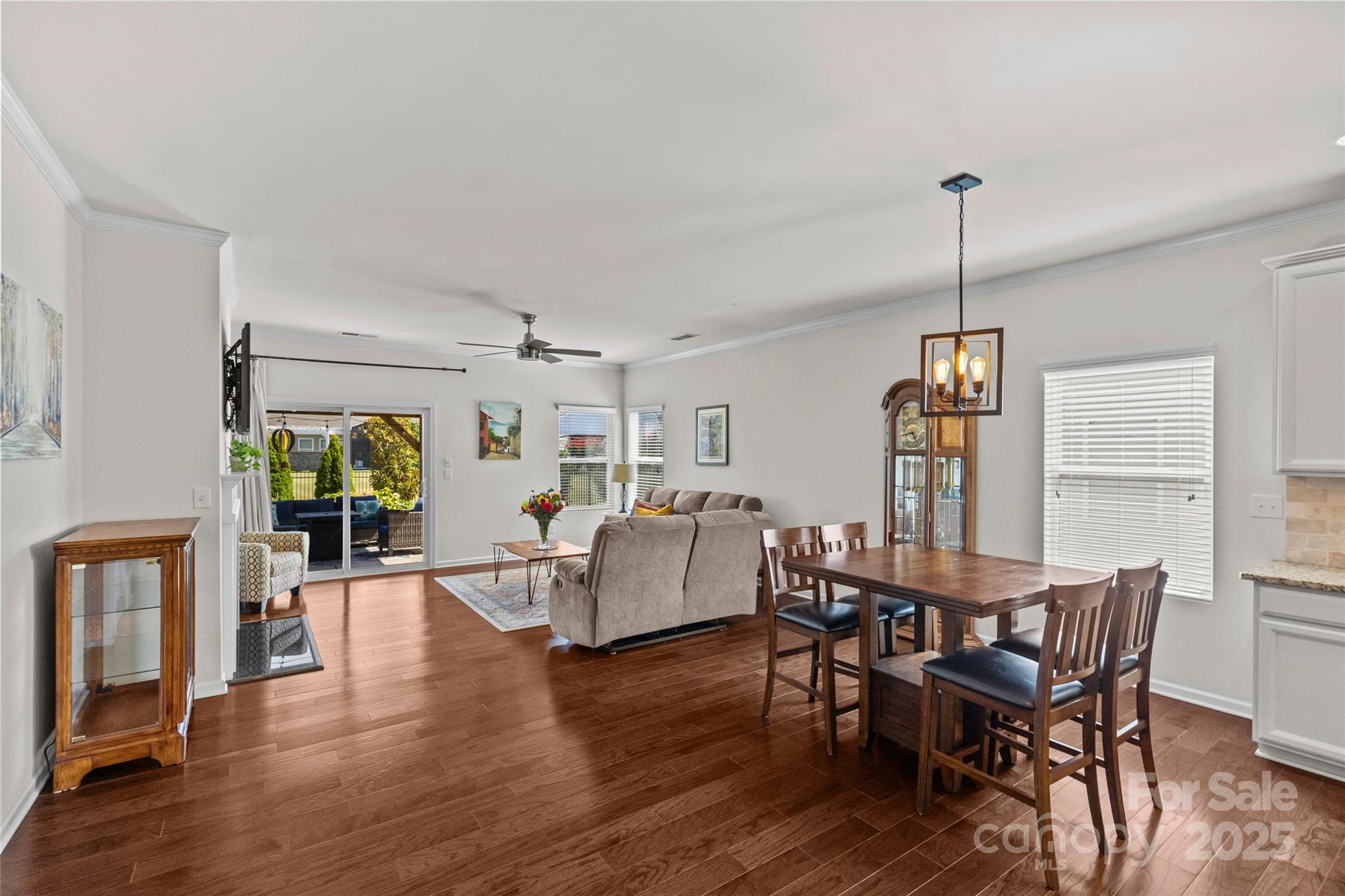 5828 Eleanor Rigby Road Charlotte, NC 28278 - Photo 19 of 39 a view of a dining room with furniture window and wooden floor