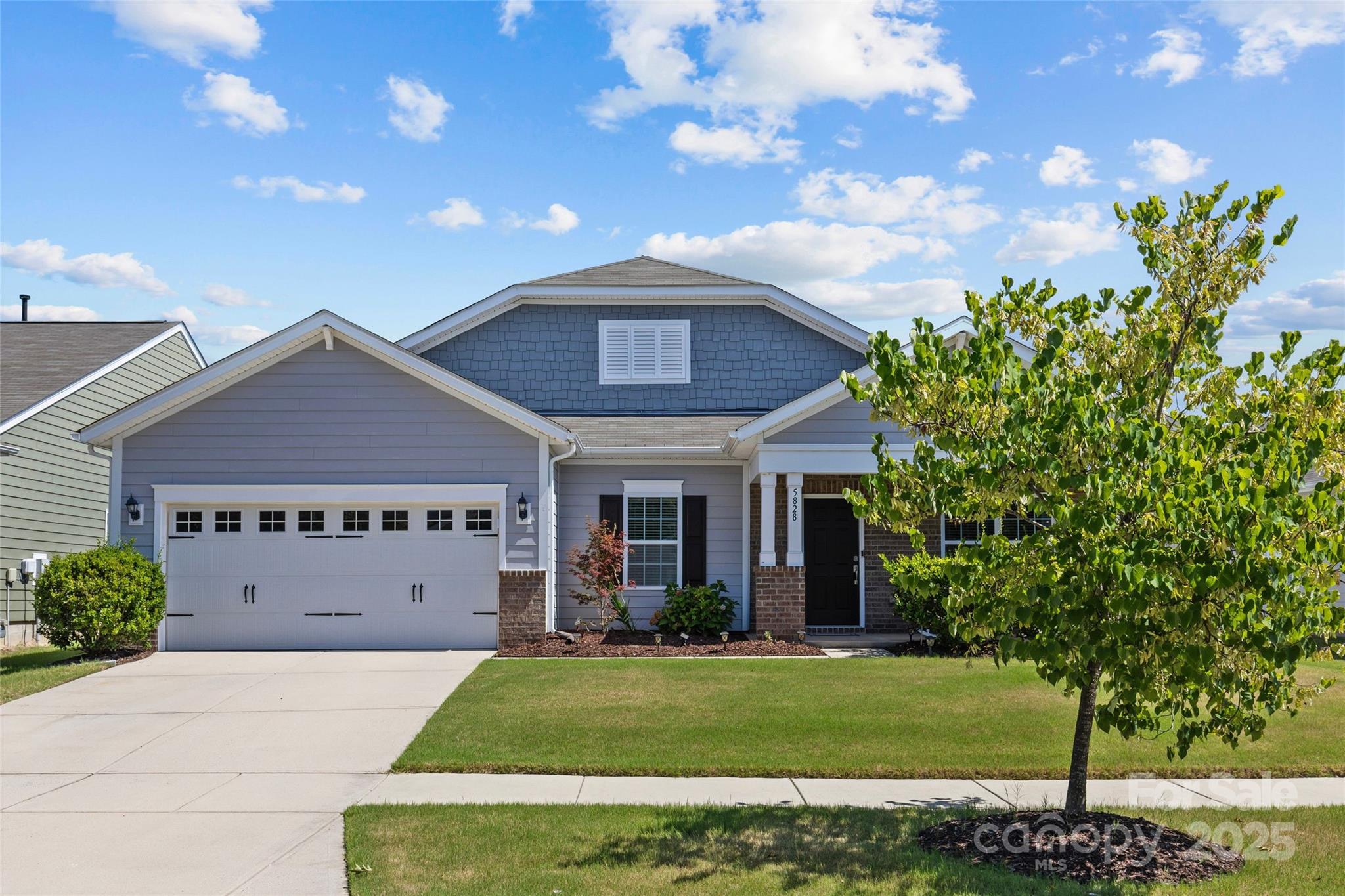 5828 Eleanor Rigby Road Charlotte, NC 28278 - Photo 2 of 39 a front view of a house with a yard