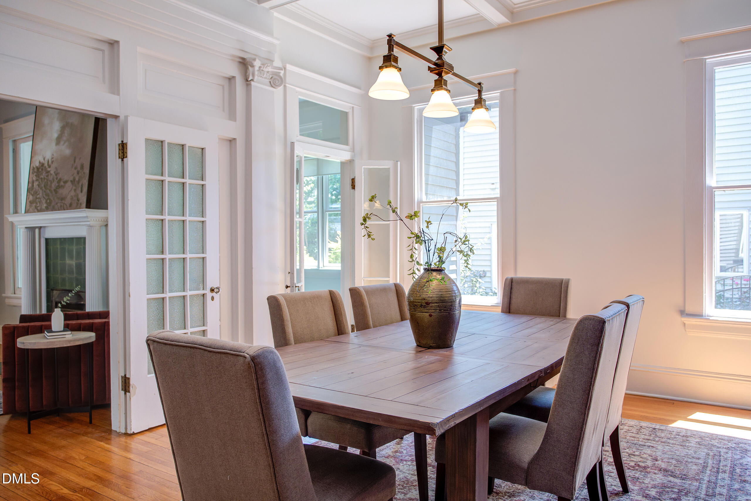 127 Forest Road Raleigh, NC 27605 - Photo 14 of 75 a view of a dining room with furniture window and wooden floor