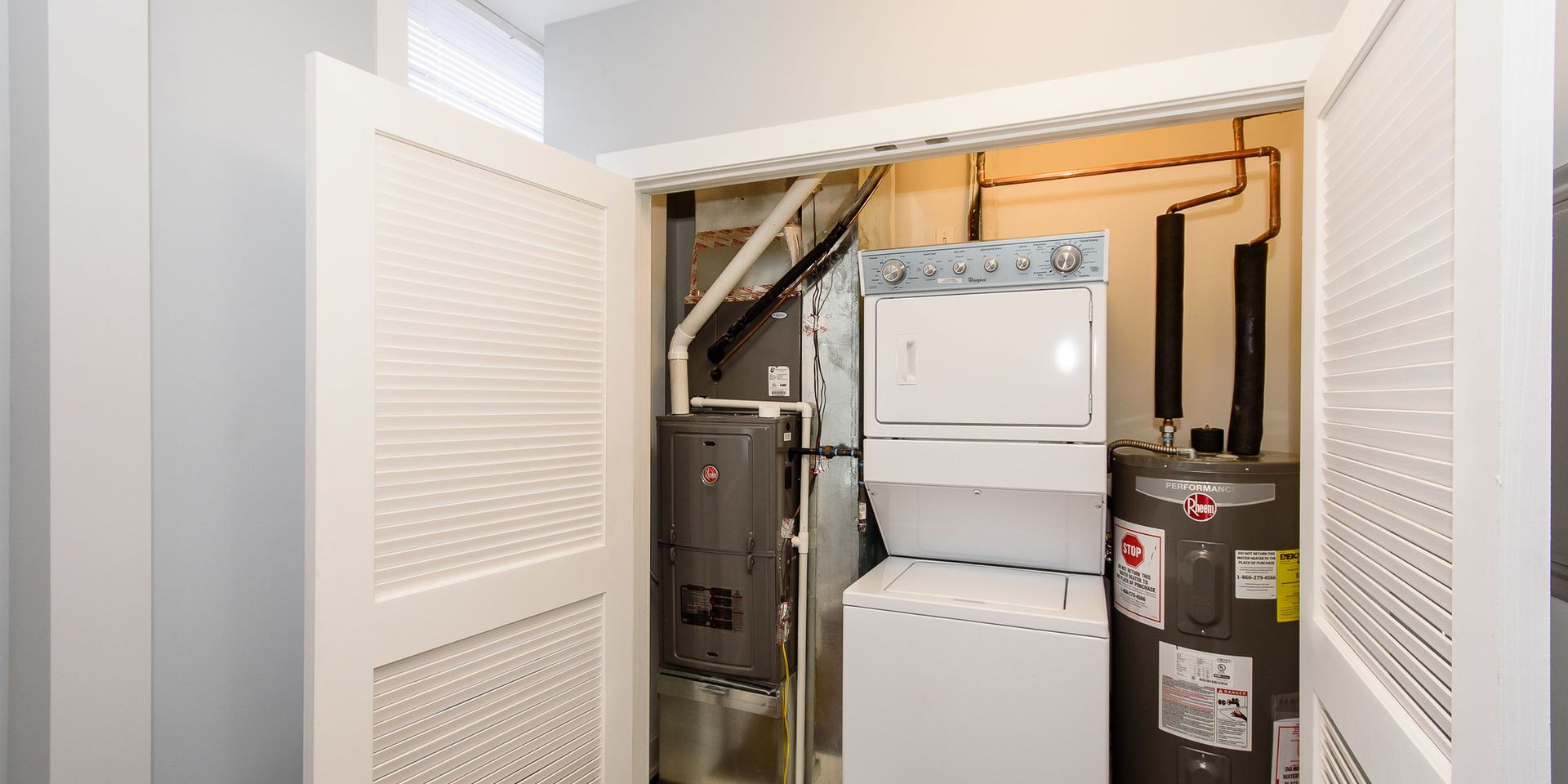 2163 North Bell Avenue, Unit 2F Chicago, IL 60647 - Photo 10 of 12 a utility room with dryer and washer