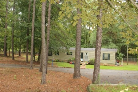 2017 Dames Ferry Road Forsyth, GA 31029 - Photo 22 of 22 a house view with a backyard space