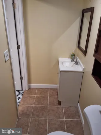 a bathroom with a sink and toilet