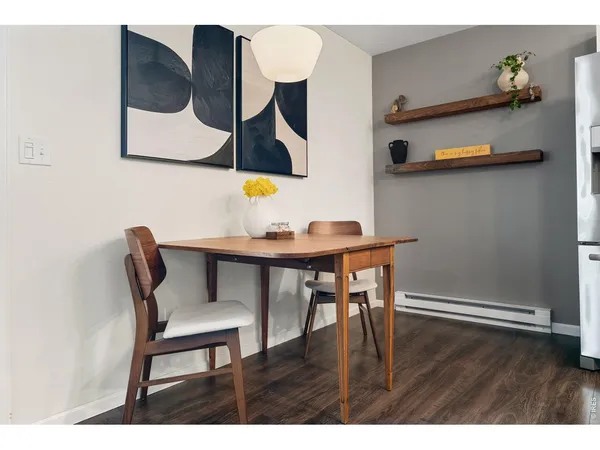 a workspace with furniture and wooden floor