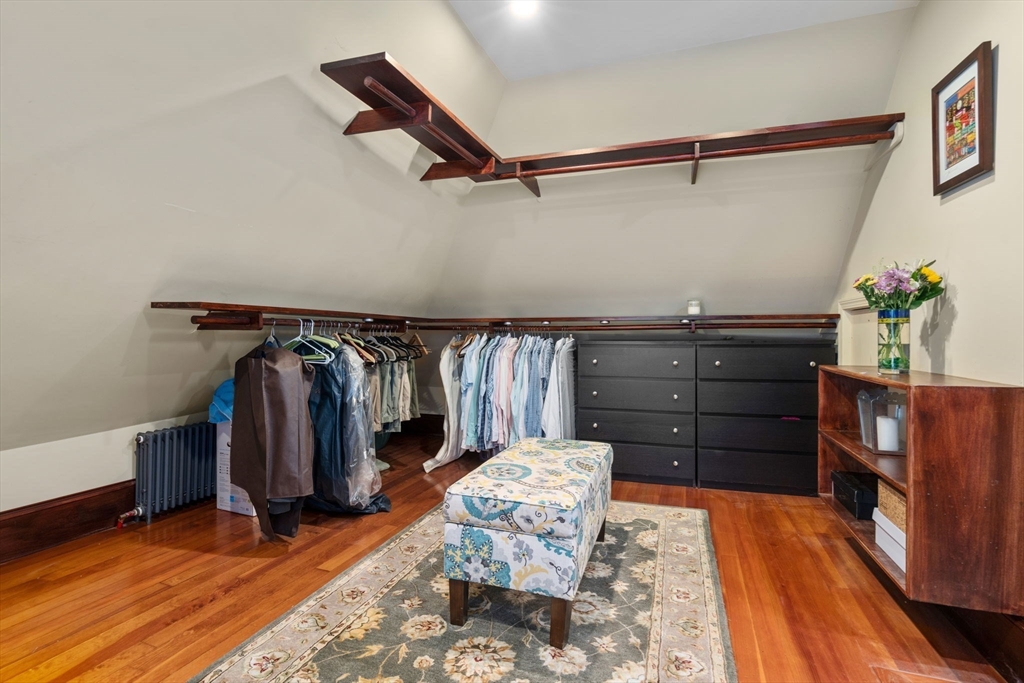 12 Zamora Street Boston, MA 02130 - Photo 18 of 28 a bed room with a bed and a dresser