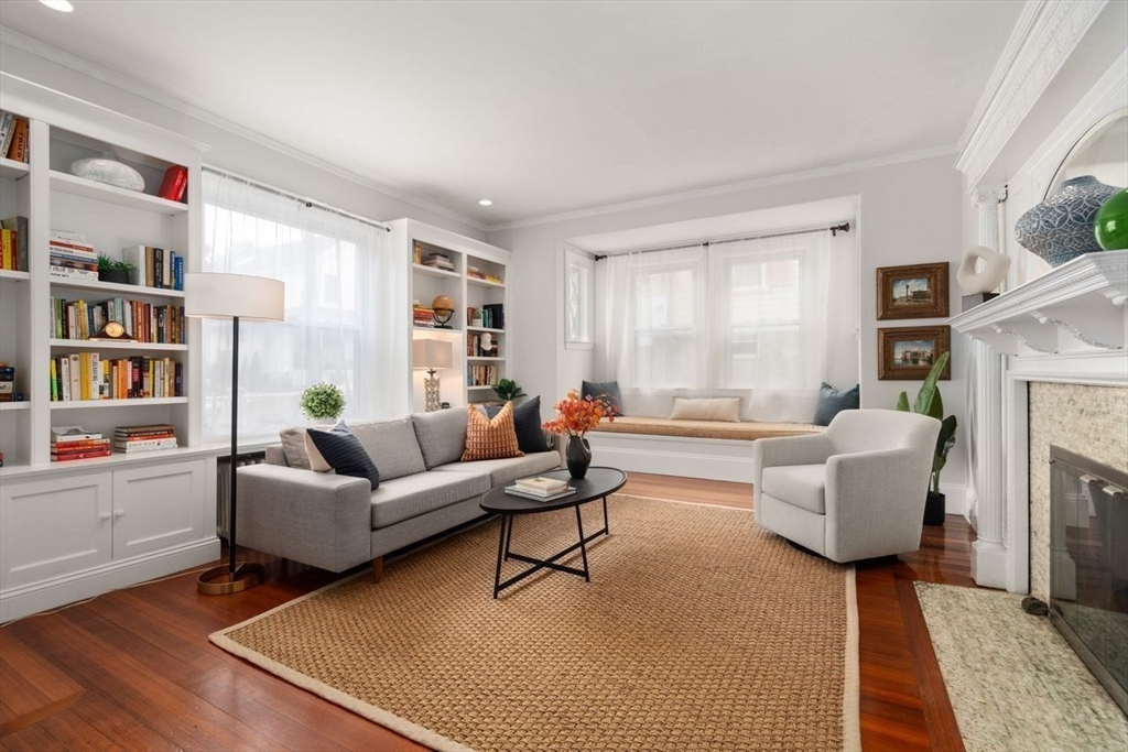 12 Zamora Street Boston, MA 02130 - Photo 4 of 28 a living room with furniture and a fireplace