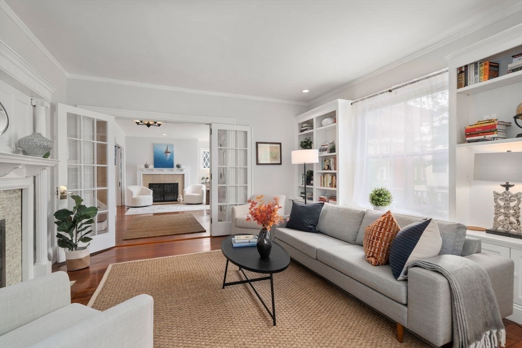 12 Zamora Street Boston, MA 02130 - Photo 5 of 28 a living room with furniture fireplace and a large window