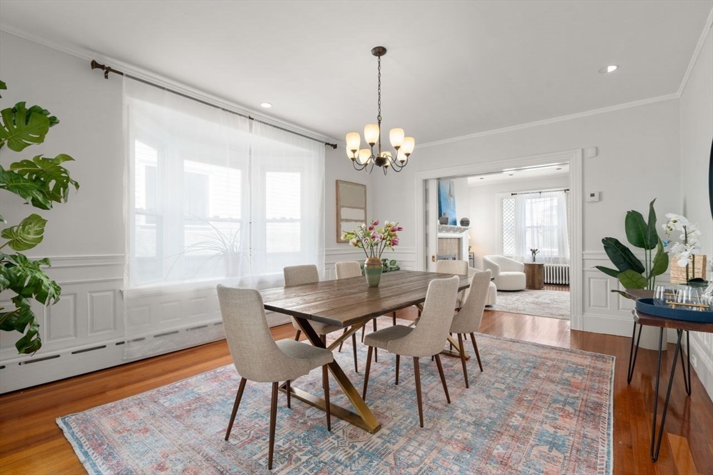 12 Zamora Street Boston, MA 02130 - Photo 9 of 28 a view of a dining room with furniture and a potted plant
