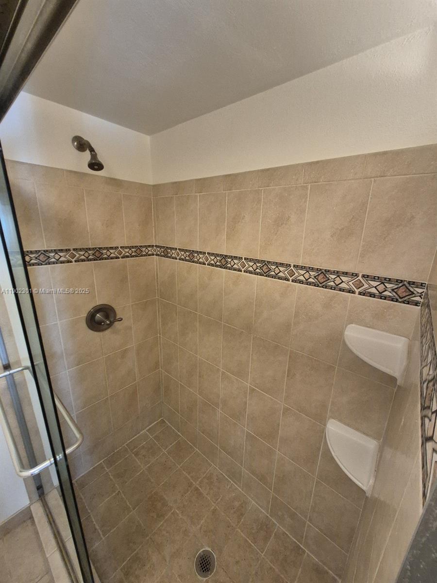 5100 Southwest 64th Avenue, Unit 201A Davie, FL 33314 - Photo 15 of 29 a bathroom with a shower