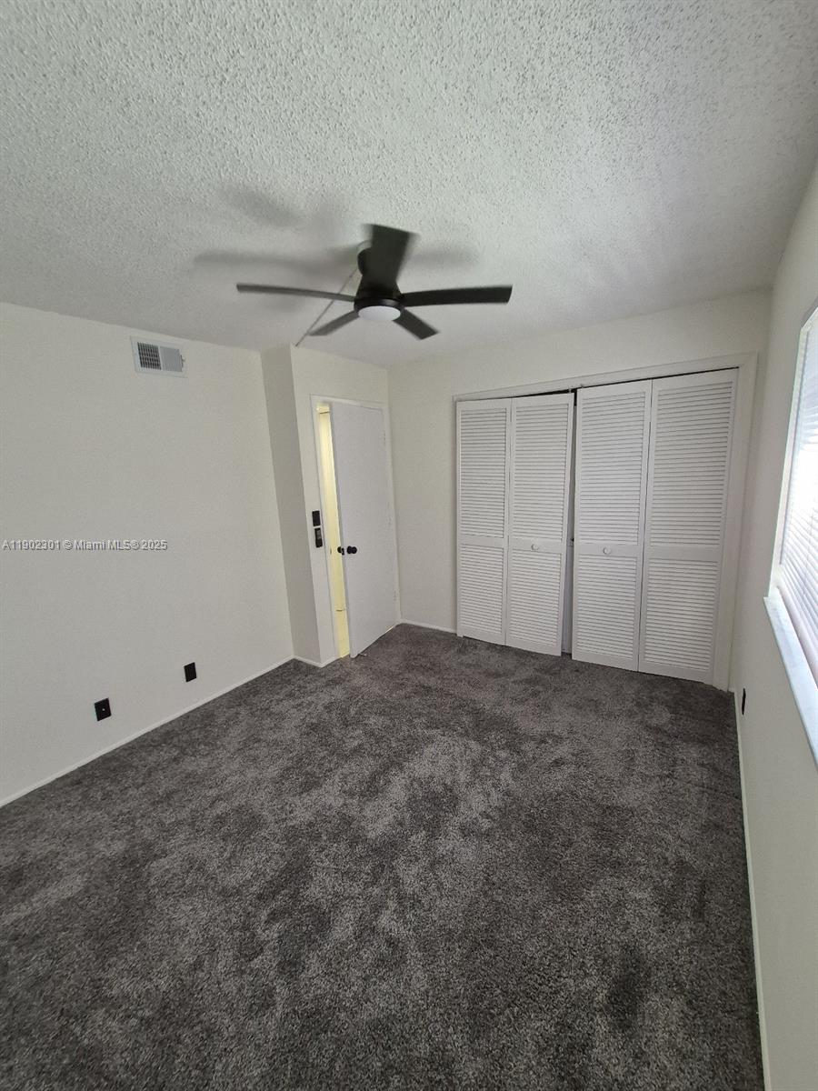 5100 Southwest 64th Avenue, Unit 201A Davie, FL 33314 - Photo 20 of 29 a view of empty room