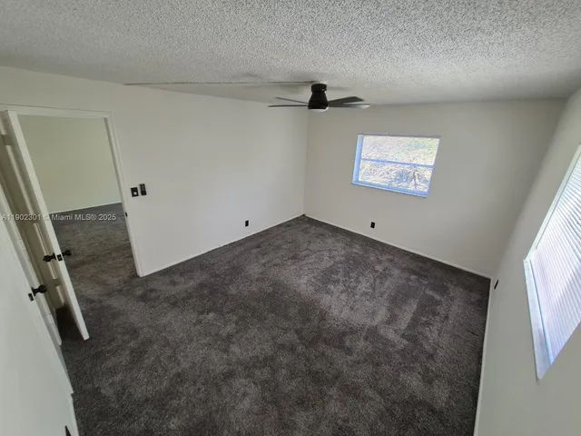 a view of a room with an empty space