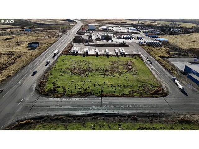 a view of a swimming pool with a yard