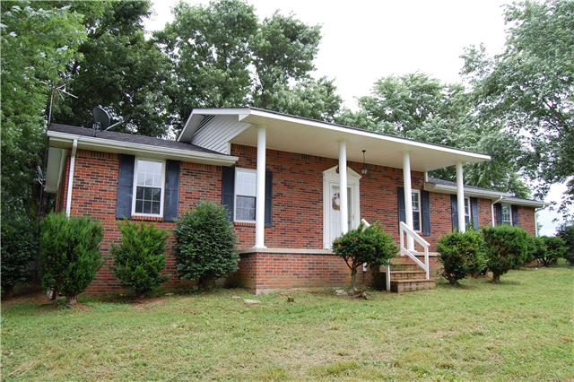 450 Rock Springs Road Castalian Springs, TN 37031 - Photo 1 of 20 450 ROCK SPRINGS RD. - All brick 5 ac horse farm w/ metal 7 stall horse barn, feed & wash room, water, electricity capability. Lg storage bldg. w/ concrete fl. & sheetrock. Mature trees, newer carpet & paint. Fenced lots, Lg bonus/game RM
