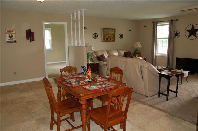 450 Rock Springs Road Castalian Springs, TN 37031 - Photo 7 of 20 Dining room opens to kitchen with tile-look vinyl
