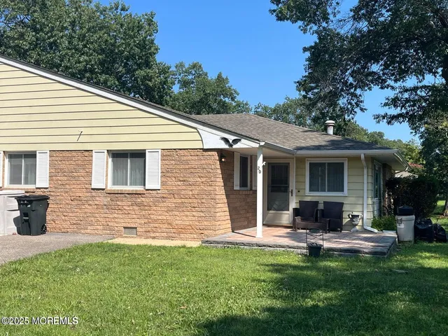 front view of a house with yard