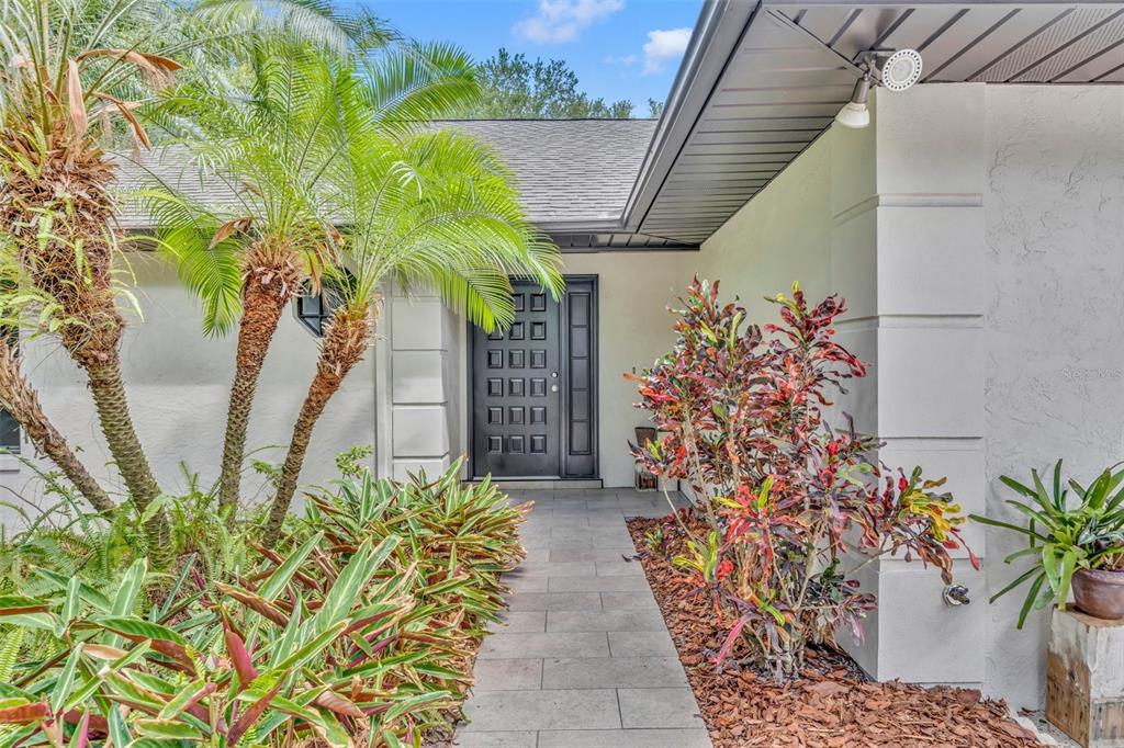 321 Groveland Road Mount Dora, FL 32757 - Photo 1 of 1 Front walkway leading to entrance of the home