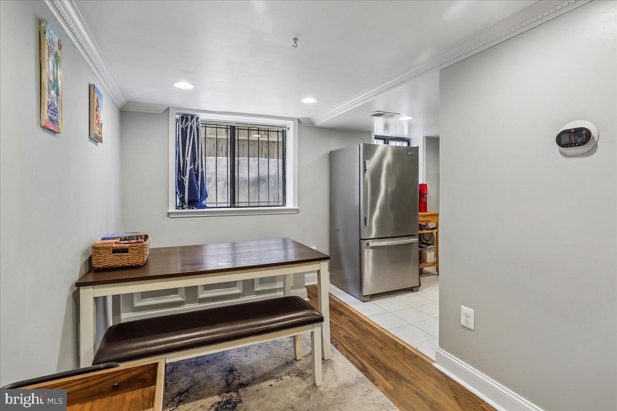 1437 Spring Road Northwest, Unit B1 Washington, DC 20010 - Photo 6 of 20 Dining area with built-in bench seating/storage