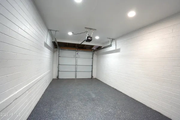 a backyard of a house with large trees