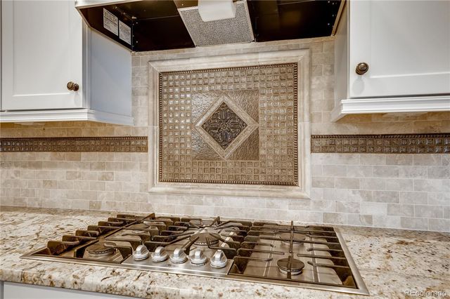 a black and white photo of a stove