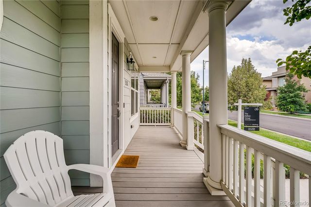 a view of balcony with furniture