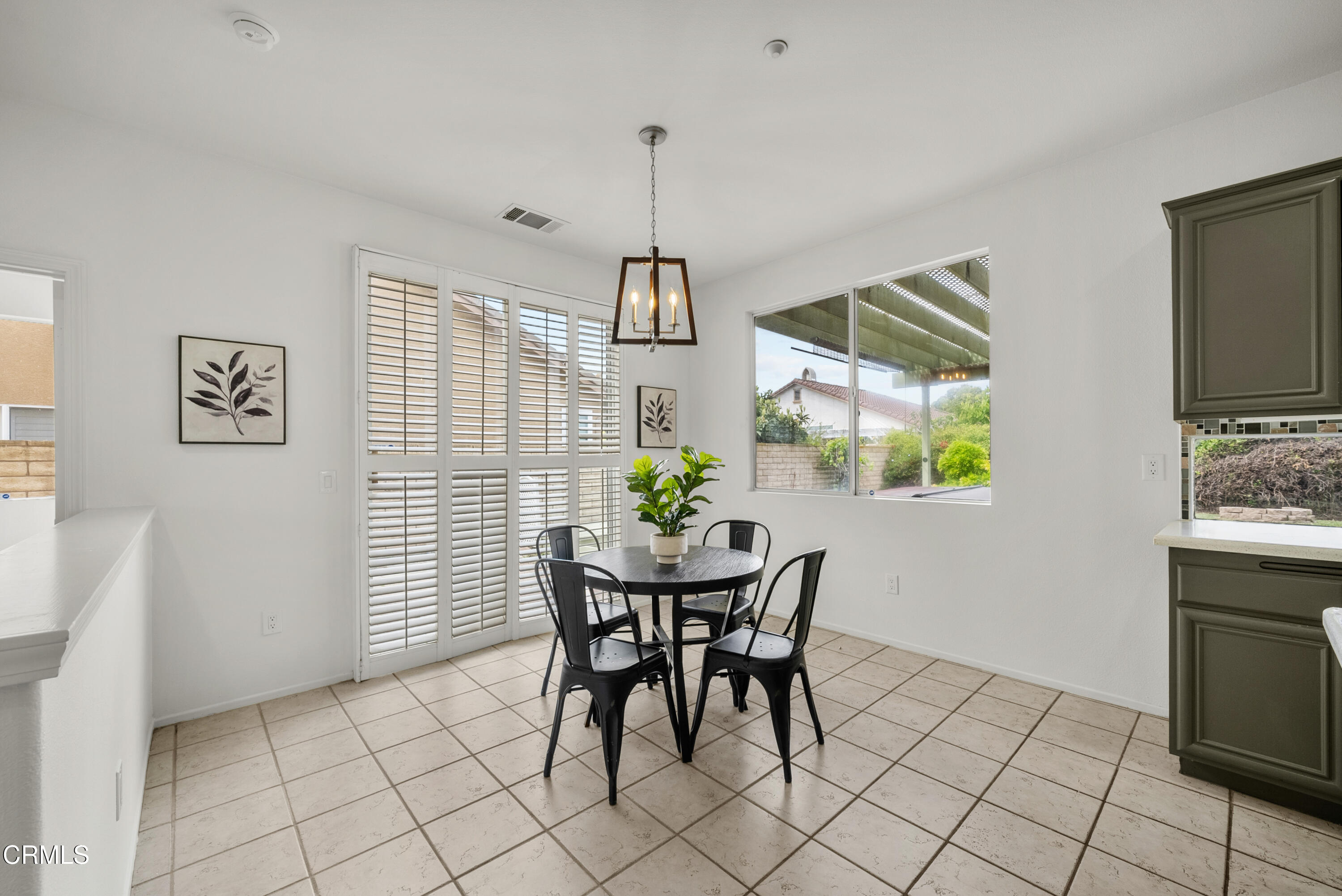 3543 Monte Carlo Drive Oxnard, CA 93035 - Photo 13 of 36 a view of a dining room with furniture