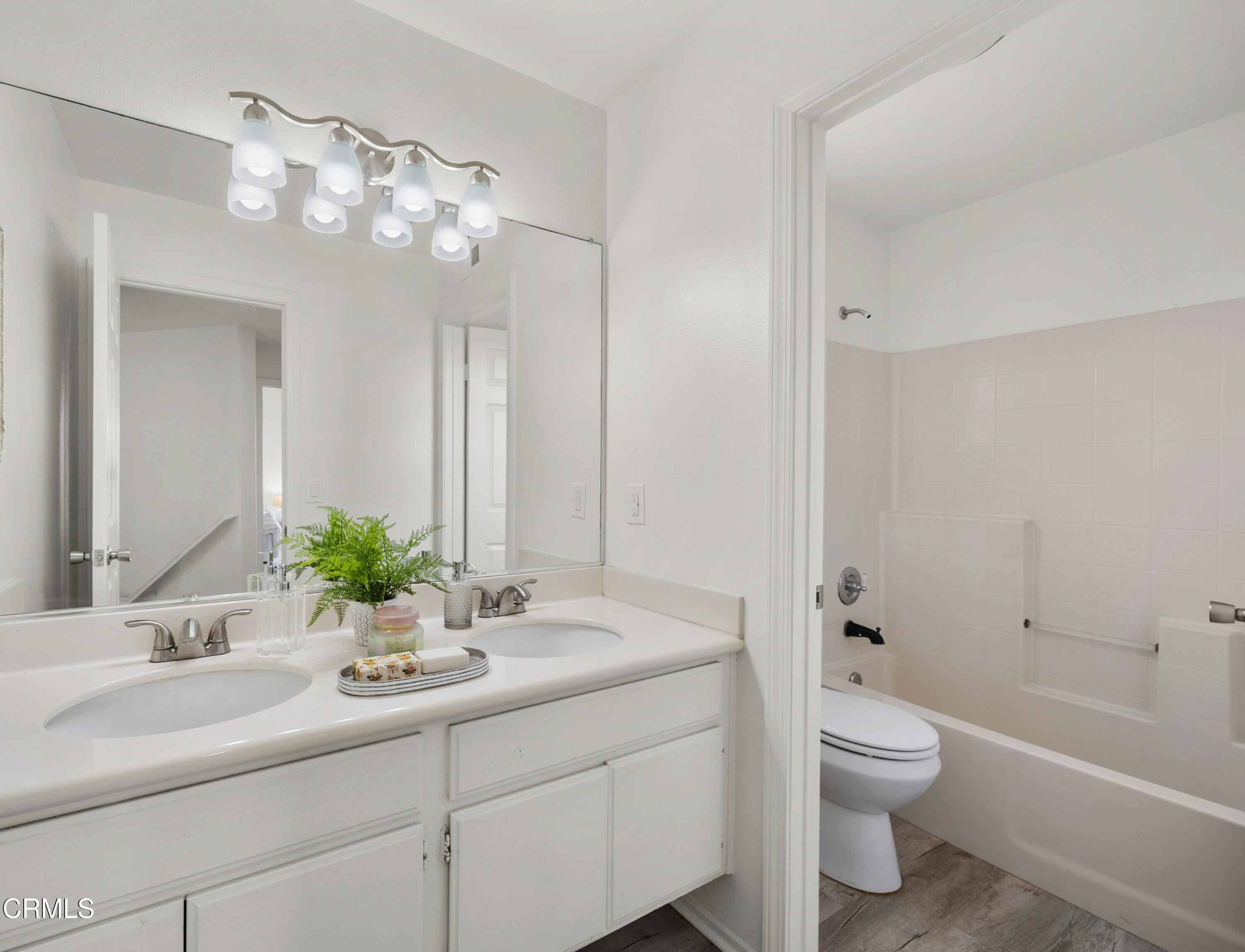 3543 Monte Carlo Drive Oxnard, CA 93035 - Photo 19 of 36 a bathroom with a sink a toilet and shower