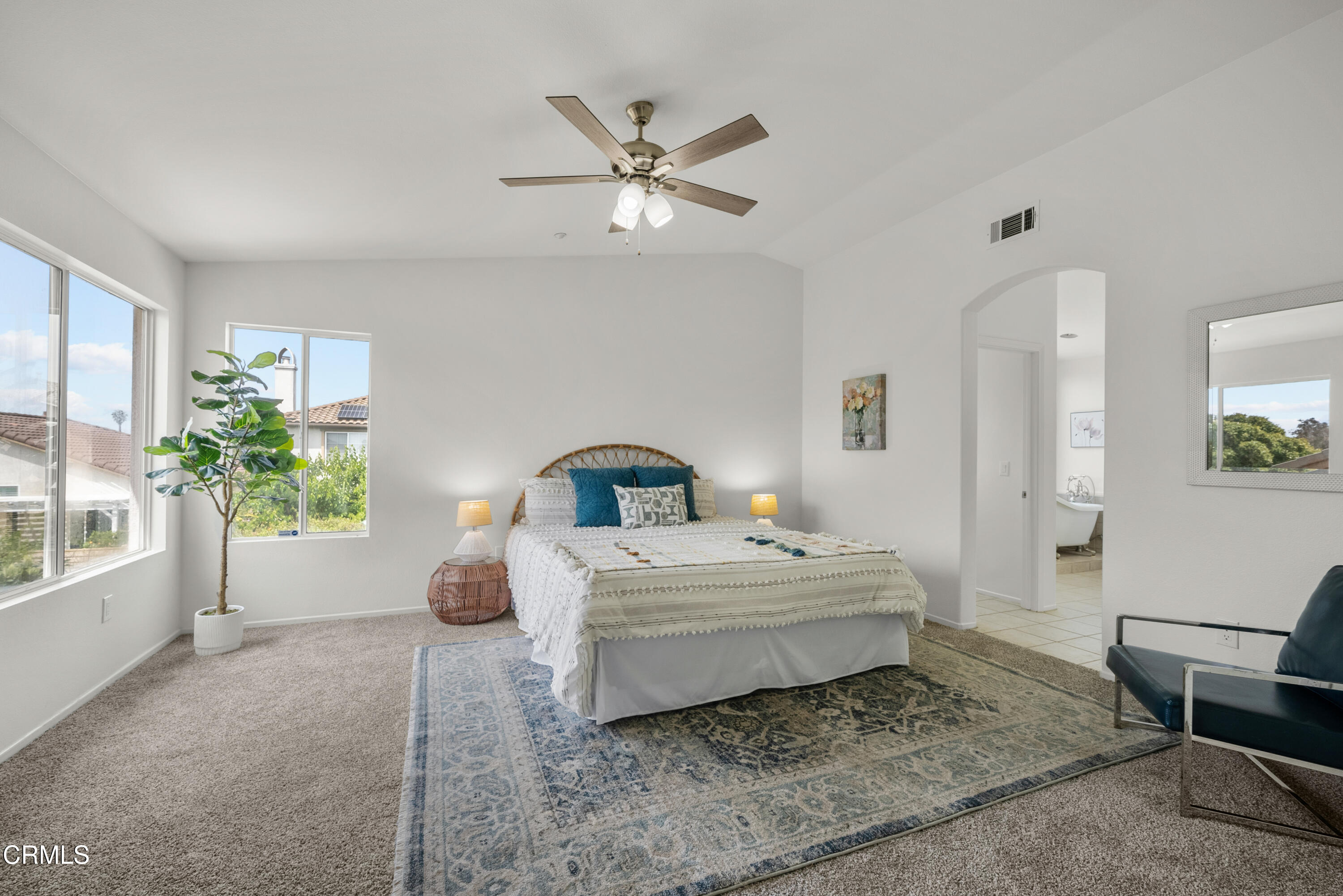 3543 Monte Carlo Drive Oxnard, CA 93035 - Photo 24 of 36 a spacious bedroom with a bed and a potted plant