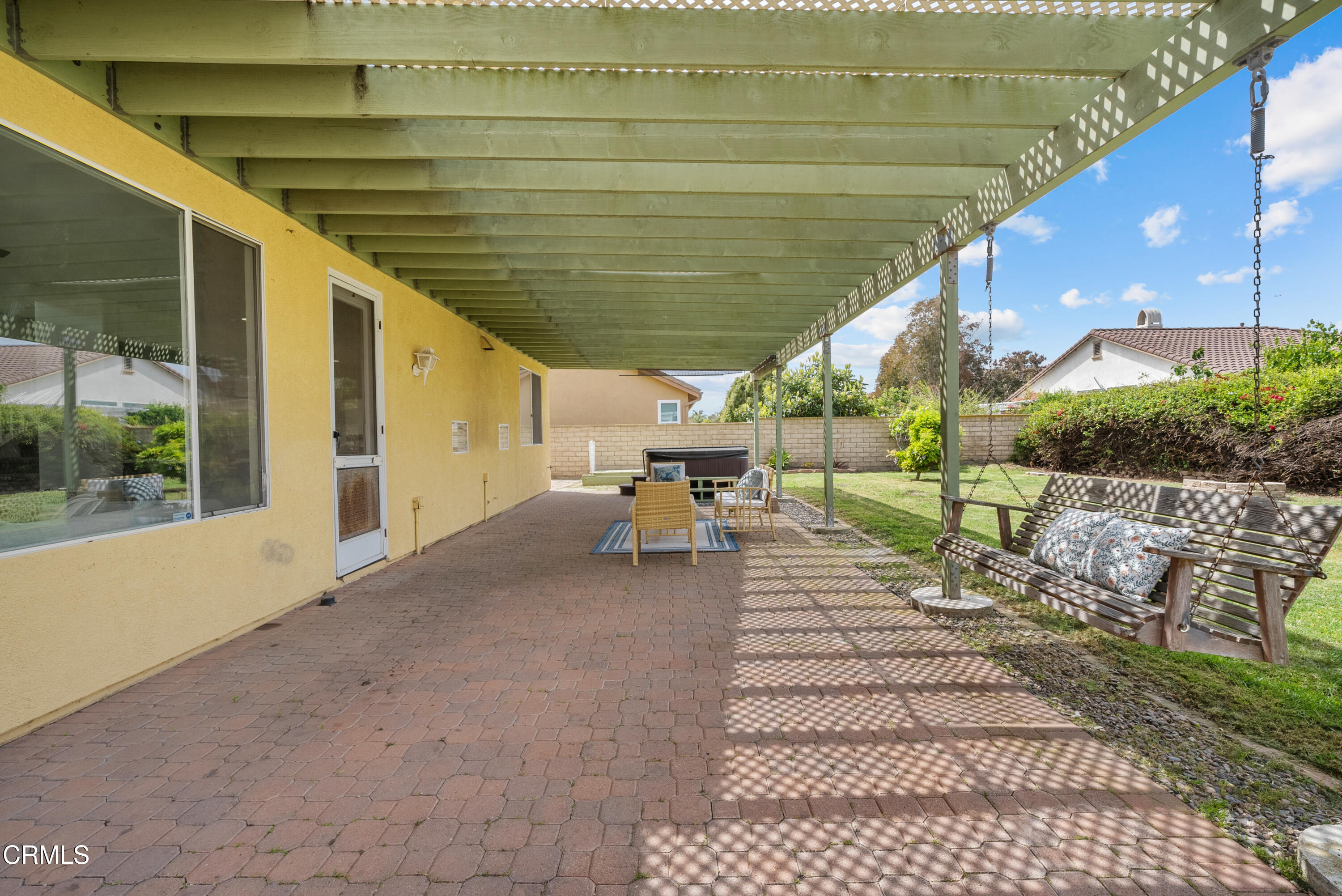3543 Monte Carlo Drive Oxnard, CA 93035 - Photo 29 of 36 a view of a patio with table and chairs with wooden floor and fence