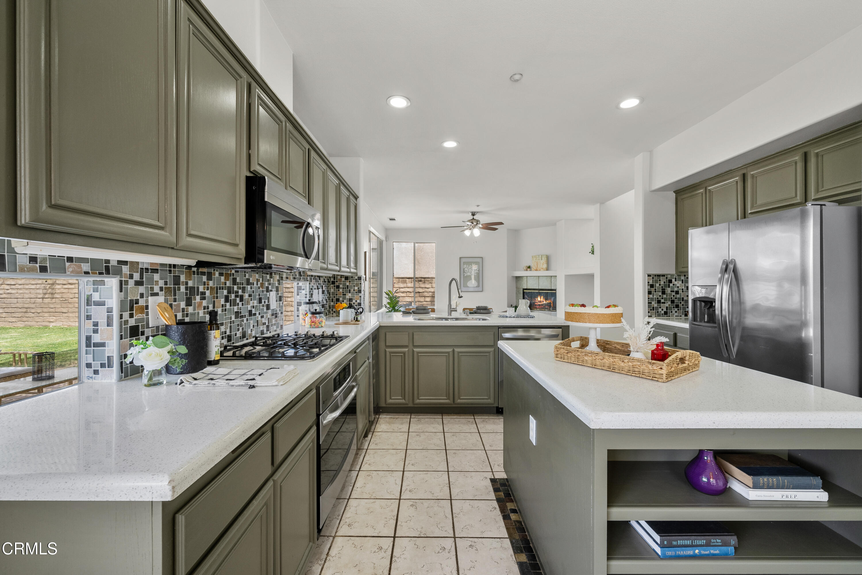 3543 Monte Carlo Drive Oxnard, CA 93035 - Photo 10 of 36 a kitchen with stainless steel appliances a sink stove and refrigerator