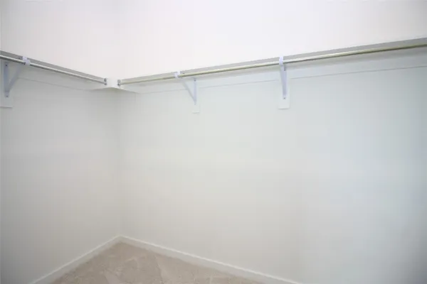 a view of a room with racks on the wall