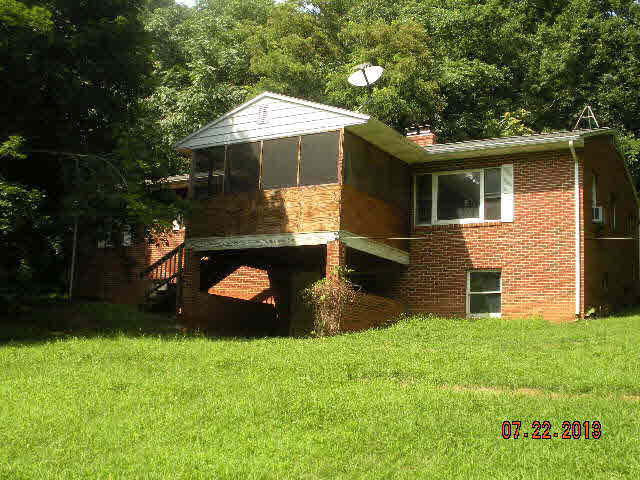 199 Towers Road Mount Solon, VA 22843 - Photo 1 of 16 a backyard of a house with seating space