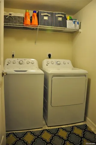 a utility room with dryer and washer
