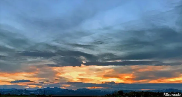a view of a city and mountain in back