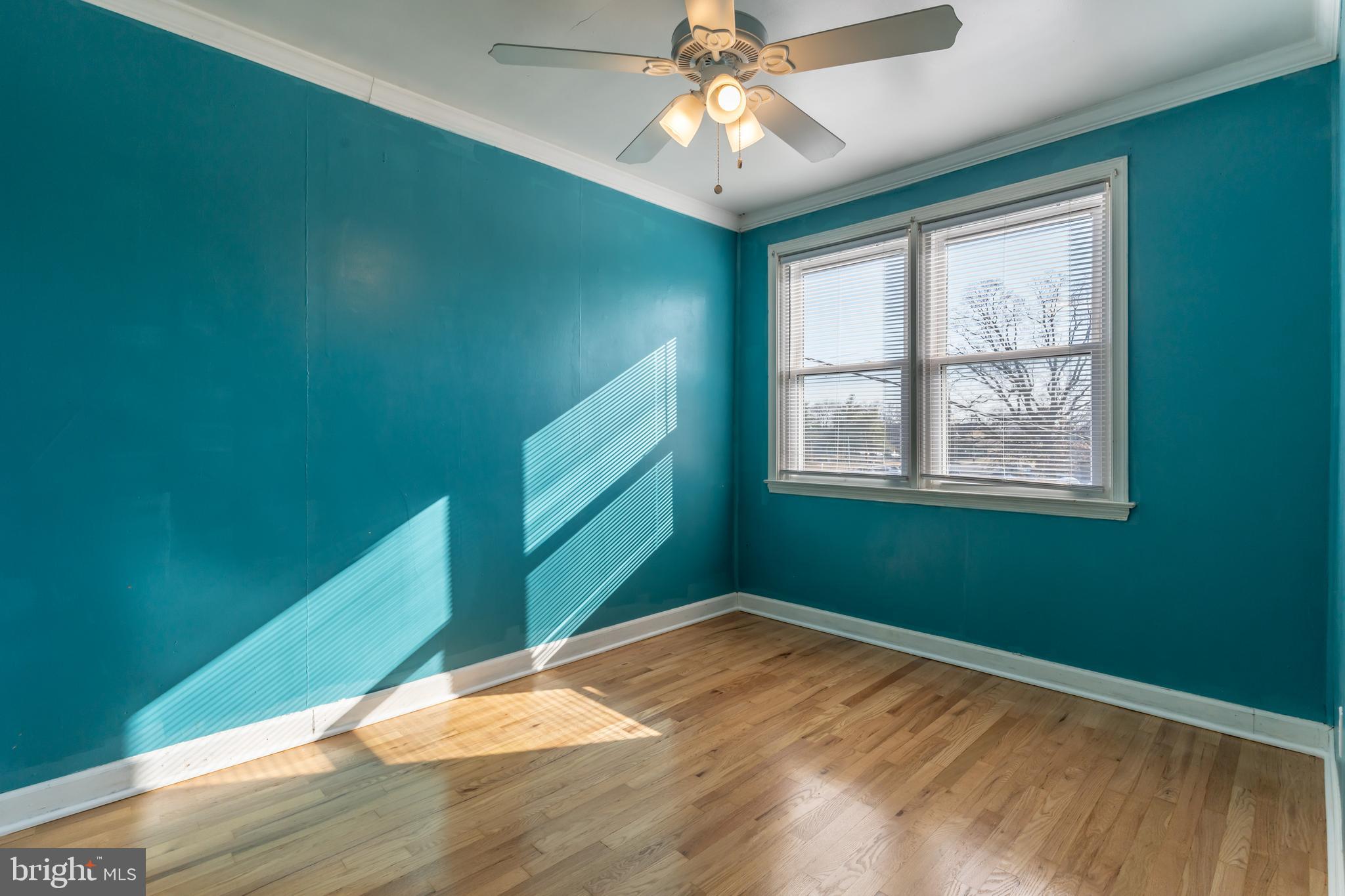 577 Welbrook Road Baltimore, MD 21221 - Photo 21 of 31 a view of empty room with window and fan