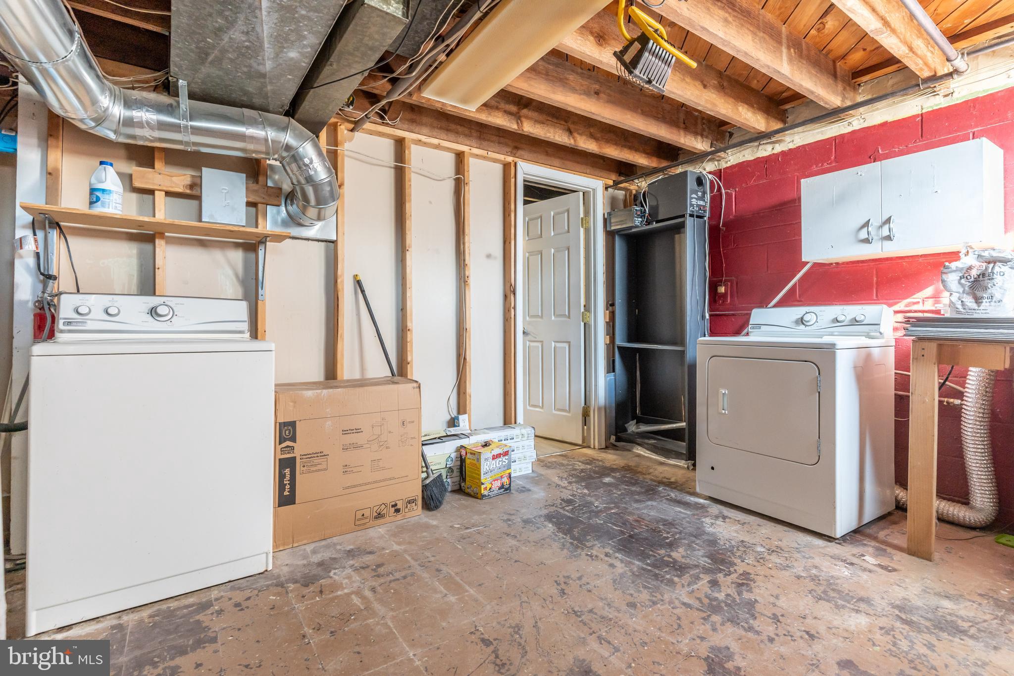 577 Welbrook Road Baltimore, MD 21221 - Photo 25 of 31 a view of storage and utility room with washer and dryer