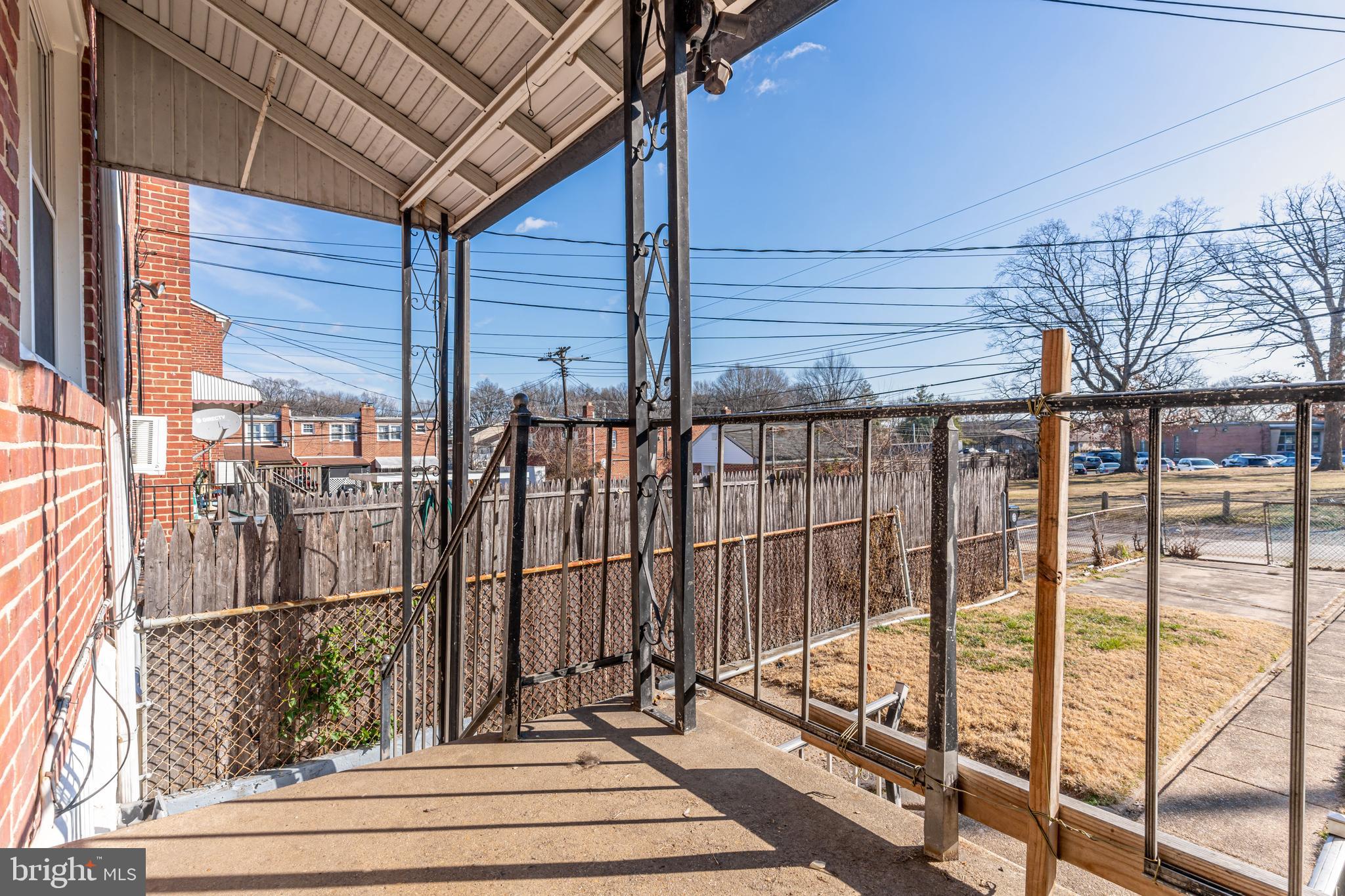 577 Welbrook Road Baltimore, MD 21221 - Photo 28 of 31 a view of entryway with wooden floor and fence