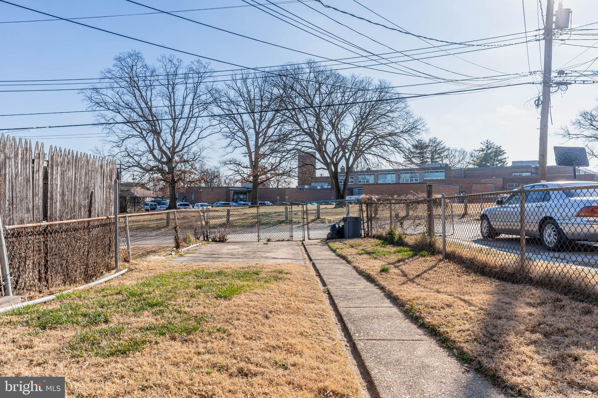 577 Welbrook Road Baltimore, MD 21221 - Photo 29 of 31 a view of a patio with couches under an umbrella