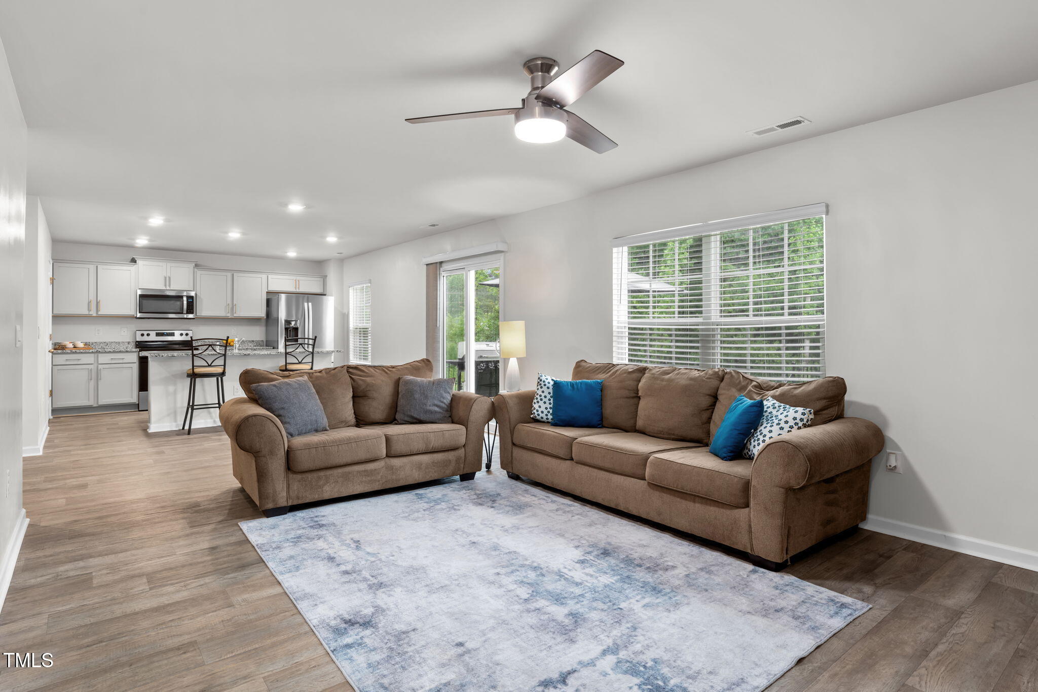 132 Rockfall Way Rocky Mount, NC 27803 - Photo 6 of 51 a living room with furniture and a large window