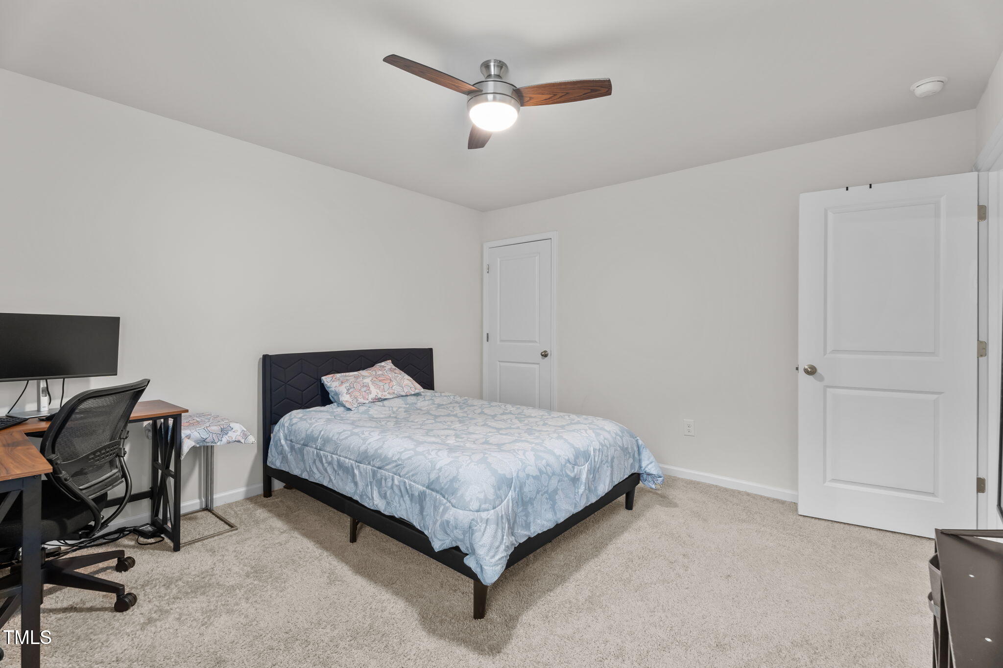 132 Rockfall Way Rocky Mount, NC 27803 - Photo 21 of 51 a bedroom with a bed a desk and chair