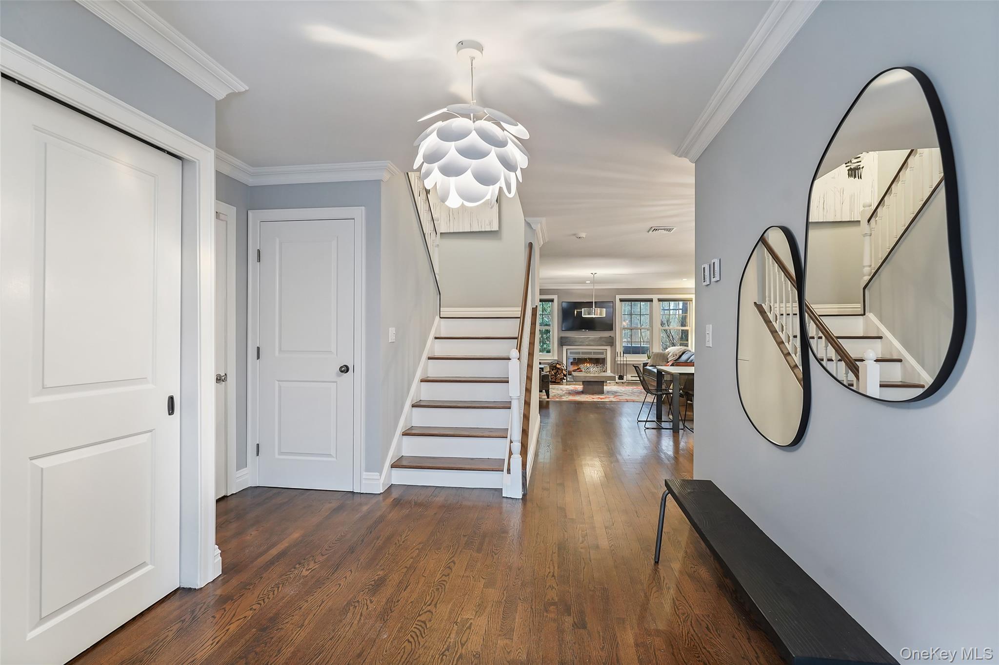 21 Croton Lake Road, Unit 6 Katonah, NY 10536 - Photo 14 of 31 Large entry foyer with coat closet, storage and door to garage