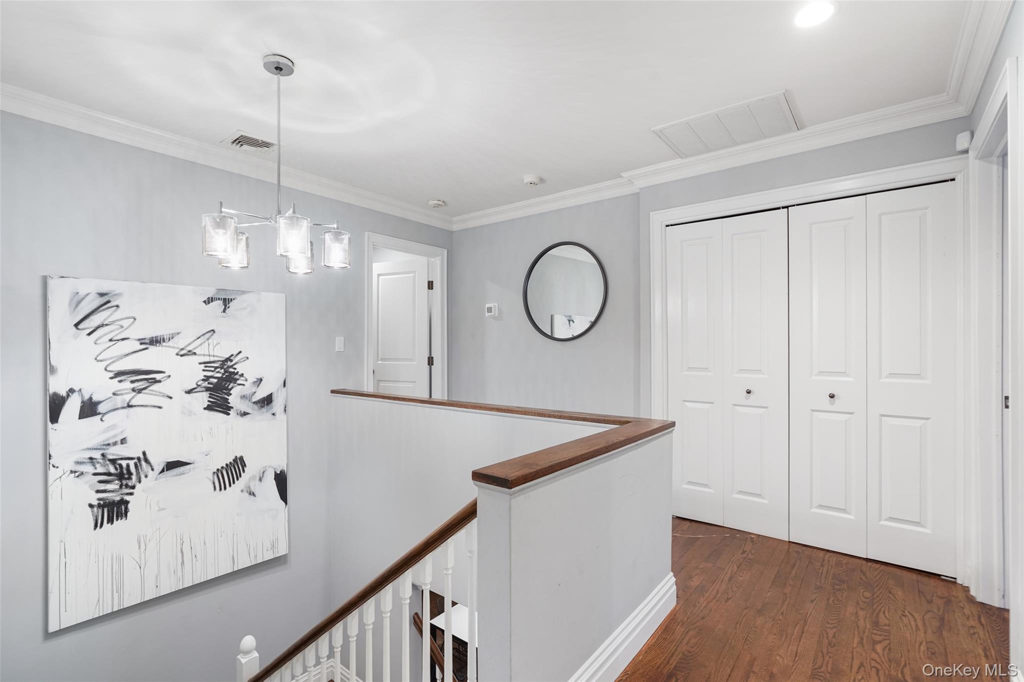 21 Croton Lake Road, Unit 6 Katonah, NY 10536 - Photo 16 of 31 Second floor landing with laundry in closet