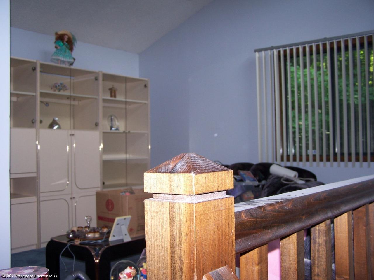 3300 Northgate Road Lake Ariel, PA 18436 - Photo 5 of 11 a room with furniture and a window