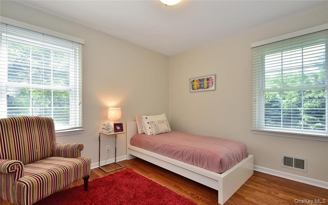 9 Franklin Avenue Rye, NY 10580 - Photo 20 of 35 a bedroom with a bed and a couch