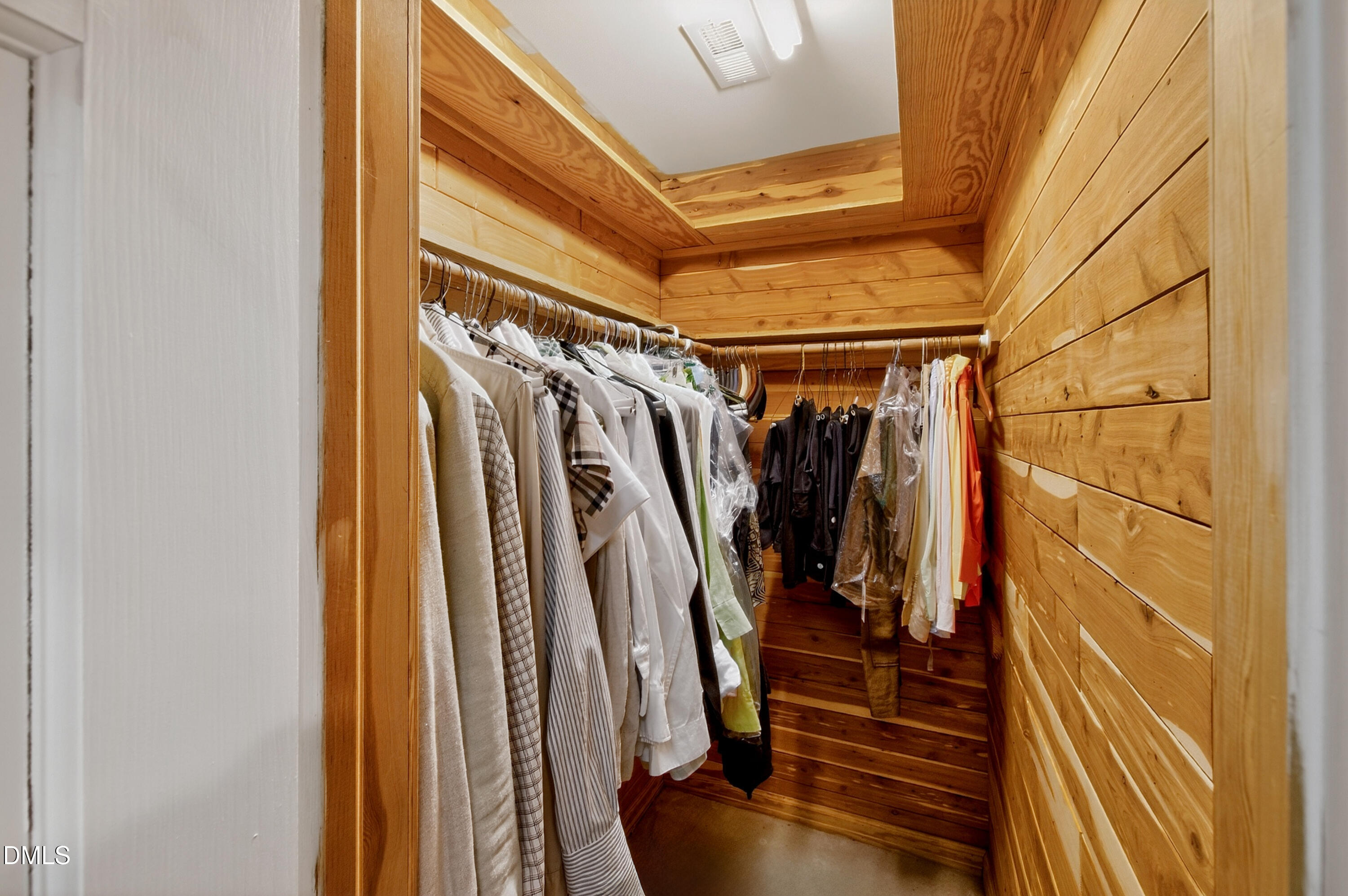 3708 Lubbock Drive Raleigh, NC 27612 - Photo 38 of 64 a view of walk in closet with clothes