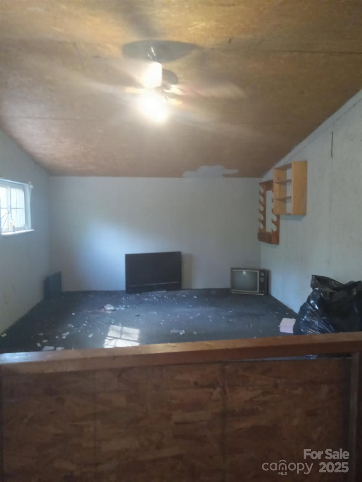 74 Lighthouse Lane Mill Spring, NC 28756 - Photo 11 of 13 a view of empty room with window