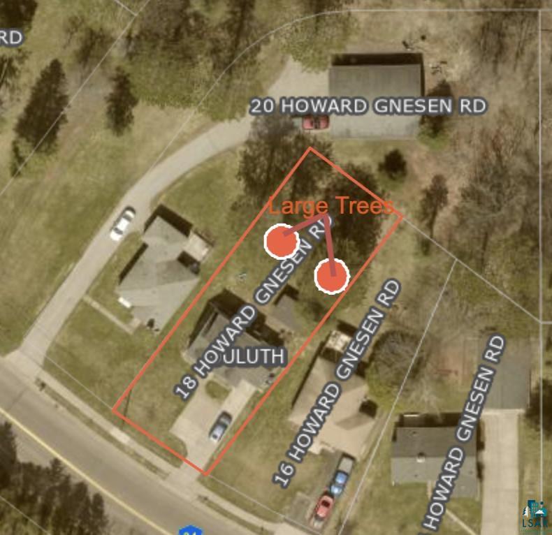 18 Howard Gnesen Road Duluth, MN 55811 - Photo 22 of 26 The large established trees are in the middle of the yard. The lot extends much further beyond those large trees, to the smaller ones on top of the hillside.