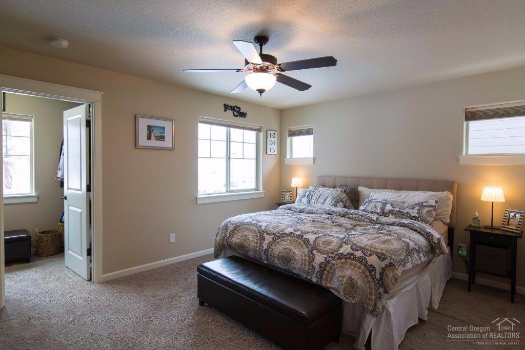 20244 Badger Road Bend, OR 97702 - Photo 15 of 25 Master suite with walk in closet and bat