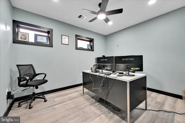 a view of a workspace with furniture