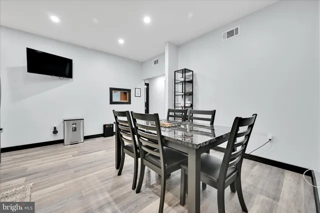 a view of a dining room with furniture