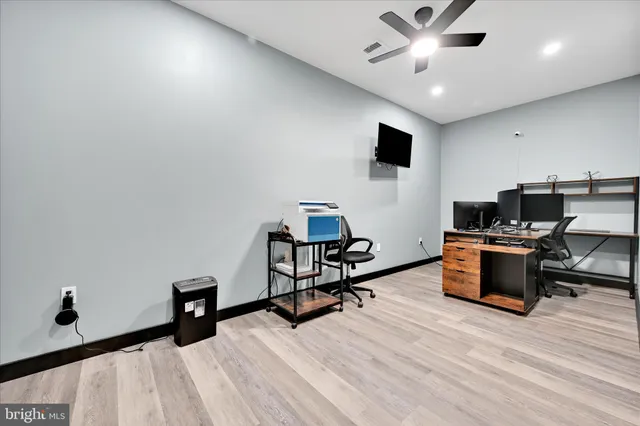 a room with furniture and a flat screen tv