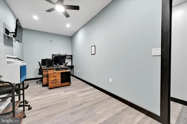 a view of kitchen with furniture wooden floor and window